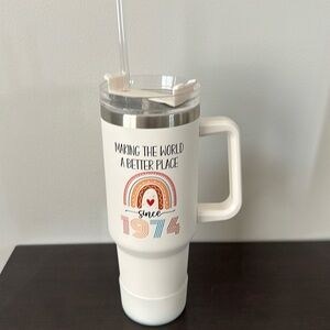 "Making the world a better place since 1974" tumbler with lid and straw